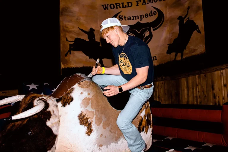 Join the thrill-seekers at Stampede Houston's mechanical bull for a night of laughter and excitement! #NightclubFun #HoustonNightlife #StampedeHoustonThrill